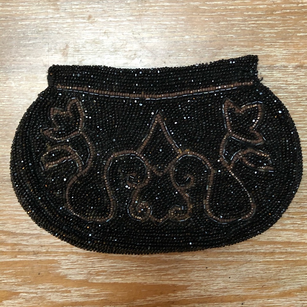 Vintage small beaded clutch with hand strap